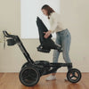 The Orbit Baby Stroller Seat being docked onto the X5 Jogging Stroller SmartHub